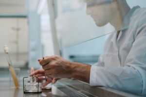 Man in lab coat working on preventive health